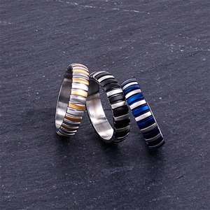 Punk style stainless steel rings for men featuring industrial striped textured finish