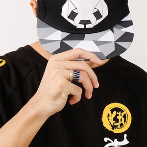 Three men's punk stainless steel rings with vertical grooves in silver, black and blue
