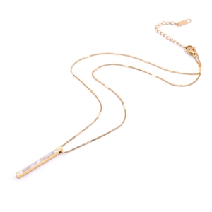 Detailed view of golden titanium necklace featuring a rectangular shell inlay pendant