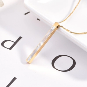 Titanium steel bar necklace with white shell pendant on a minimalist art card
