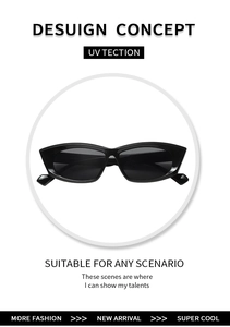 Close-up of black narrow cat-eye sunglasses with UV protection lenses and shiny finish