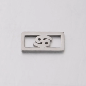 Macro view of silver hollow rectangular Cancer zodiac charm for DIY jewelry making