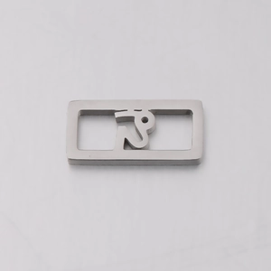 Close-up of a silver rectangular hollow pendant with matte finish and athlete silhouette