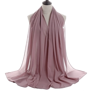 Detail view of dusty rose chiffon hijab showing breathable fabric texture and stitching