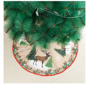 Detailed top view of 84cm beige Christmas tree skirt with reindeer and cedar patterns