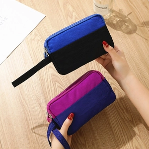 Three-layer nylon wristlet phone bag for women in blue and purple contrast colors