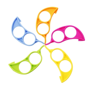 Five-color plastic citrus peelers in a circular layout for peeling oranges and lemons