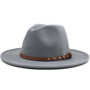 Detail of grey wool felt fedora featuring a brown leather belt with gold metal studs