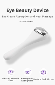 Mini alloy eye cream applicator showing rolling metal ball for massaging under-eye area