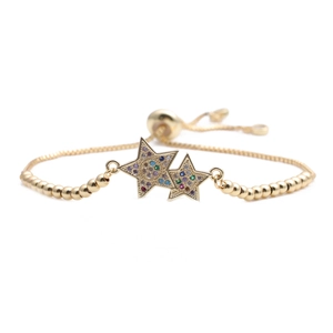 Macro detail of star bracelet with vibrant multicolored cubic zirconia and sliding chain