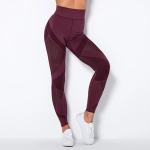 Macro detail of high-waist yoga leggings featuring breathable mesh panels and striped textures