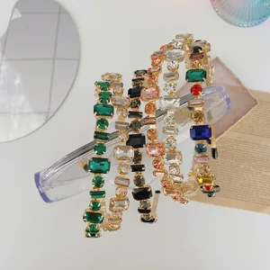 Baroque crystal headband set with rhinestones in multiple colors on white background