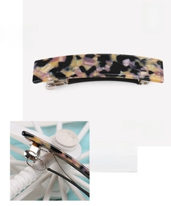 Dettagli della molletta in acetato tartarugato con dimensioni 8,2 cm e clip a molla in metallo