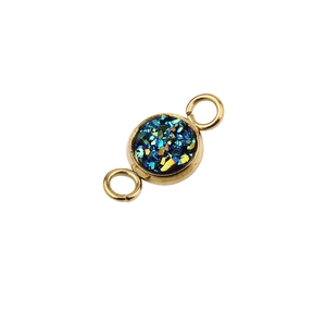 Detailed close-up of a 6mm gold vacuum-plated stainless steel star charm with two side loops