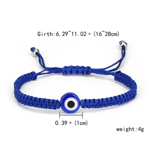 Detail view of adjustable blue woven evil eye bracelet with size and weight parameters