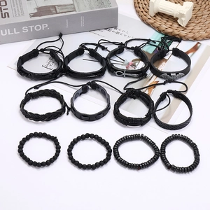 Set of 12 black woven leather bracelets with beads and vintage metal charms for men