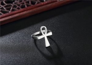 Macro shot of silver stainless steel Ankh cross ring with Egyptian pharaoh guardian design