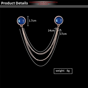Detailed view of rose gold tassel collar pin with purple gems and chain length specs