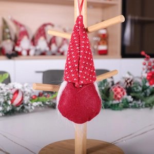 Red Christmas gnome ornament with polka dot hat and white beard for tree decoration