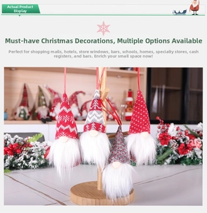 Detailed view of four festive knitted Christmas gnomes with heart and snowflake patterns