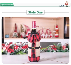 Detail of red and black buffalo plaid wine bottle cover with rustic burlap collar and belt