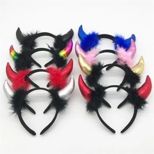 Selection of colorful Halloween devil horn headbands with feather trim decorations