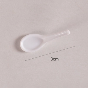 Miniature white ceramic spoon for dollhouse kitchen with polished finish 3cm long