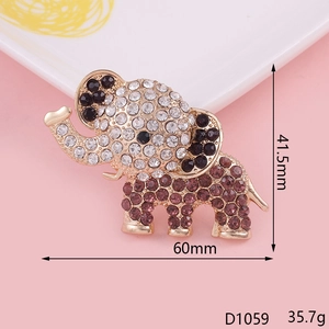 Detail view of a vintage elephant brooch with sparkling rhinestones and gold alloy finish