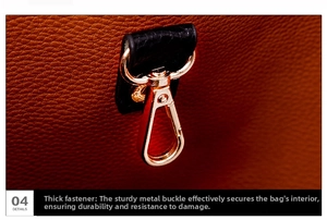 Detailed macro of golden metal hook and litchi texture on brown leather tote bag