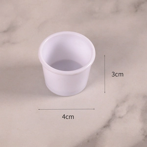 Miniature white plastic food container with 3cm height and 4cm diameter dimensions
