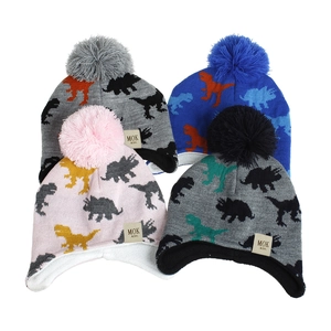 Detail view of colorful knit hats featuring dinosaur patterns and warm fleece lining