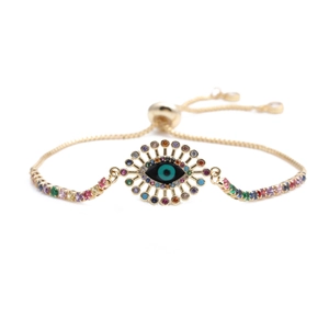 Adjustable warm gold evil eye chain bracelet featuring colorful cubic zirconia stones