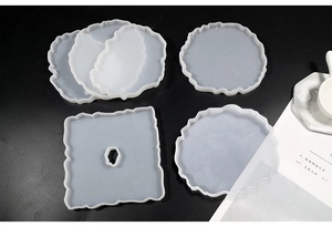 Detail view of 4-piece set silicone resin molds for wavy coasters and jewelry trays