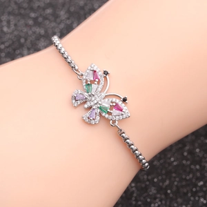 Silver butterfly bracelet with colorful zircon stones on wrist model for jewelry display