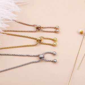 Adjustable stainless steel bracelets in rose gold, gold and silver finishes with charms