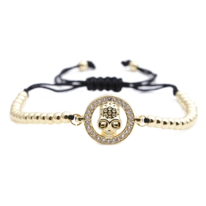 Adjustable skull charm bracelet with micro-paved zircons and black woven cord