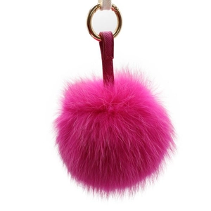 Porte-clés pompon en fourrure de renard rose avec lanière en cuir et anneau doré