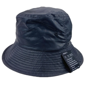 Stylish navy waxed cotton bucket hat with decorative MERCI label and flat top design