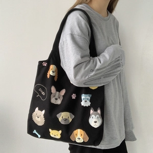 Retro black canvas tote bag for women featuring cute cartoon dog illustrations