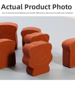 Macro detail of bear and toast shaped brown makeup sponges with fine matte texture