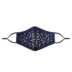 Detail of dark blue silk face mask with pearl embellishments and adjustable ear loops