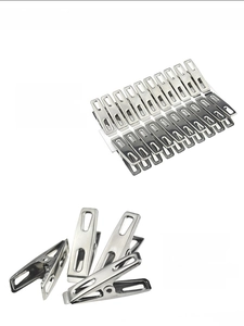 Close-up of stainless steel multi-purpose flat clips with strong metal spring tension