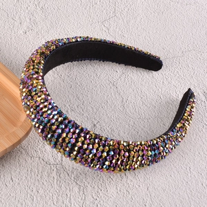 Detailed view of luxury wide headband featuring high-density colorful rhinestone beadwork