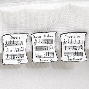Broches en émail minimalistes avec partitions de musique et citations inspirantes