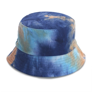 Close-up of tie-dye corduroy bucket hat texture showing blue and orange pattern detail