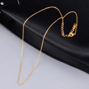 Polished 18K gold plated stainless steel cross necklace with lobster clasp on leather