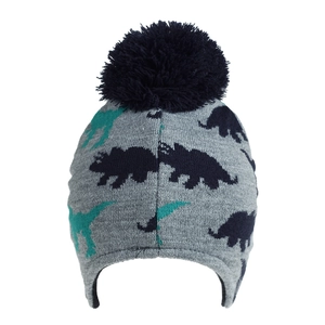 Detail of grey knit baby hat featuring navy dinosaur patterns and a large fluffy pom-pom