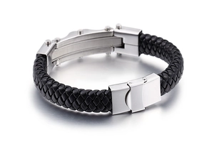 Detail of woven black leather strap and polished stainless steel clasp on a men's bracelet