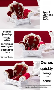 Detailed view of mini Baroque red velvet jewelry sofa stand for earring and ring storage