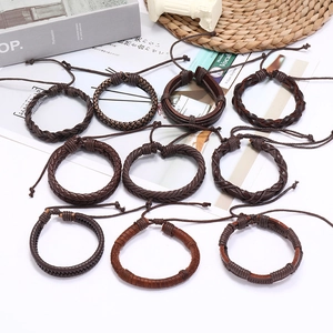 Set of 10 brown multi-layer braided leather bracelets for men and women on white background